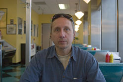 Tom at the Zoom Restaurant waiting for breakfast